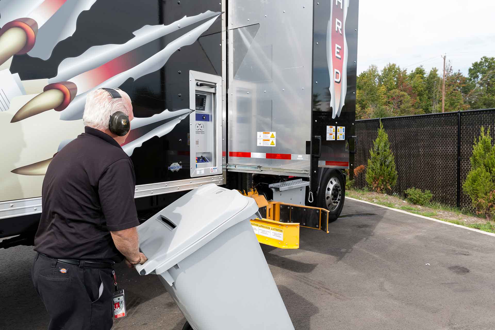 employee working on purge shredding